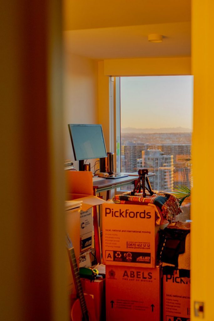 10 sustainable packing tips for a low-waste move abroad 5 Postcards from Hawaii travel and lifestyle blog. 10 sustainable packing tips for a low-waste move abroad. Checklist for moving overseas. Tower of stacked moving boxes.