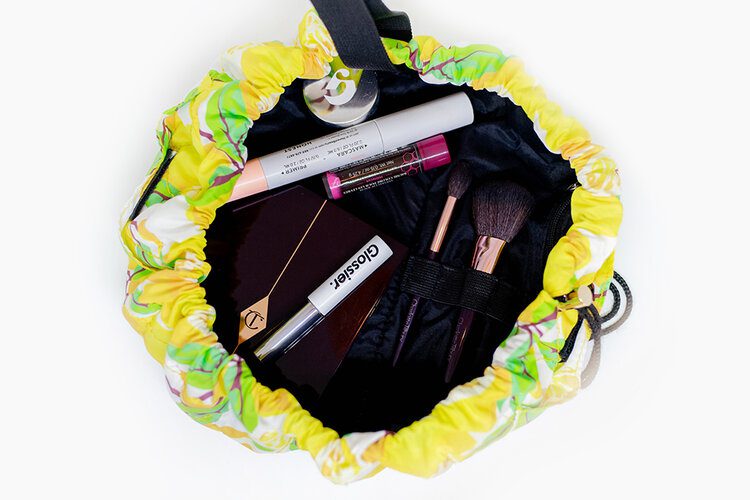 What’s in my travel bag (updated) 16 PFHPostcardsfromHawaiiTravelbagMakeupFlayLayCo