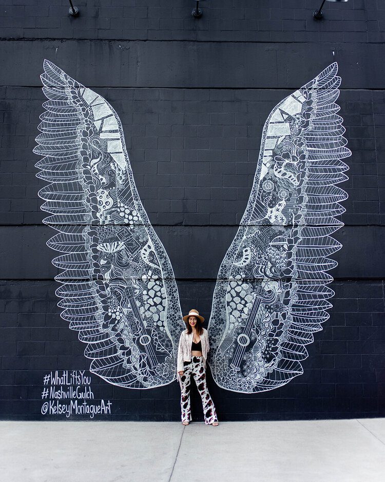 6 of the best murals in Nashville, Tennessee 12 Postcards from Hawaii Travel & Lifestyle blog 6 of the best murals in Nashville Tennessee, Murals in Nashville, angel wings Nashville, best murals in Nashville, I believe in Nashville