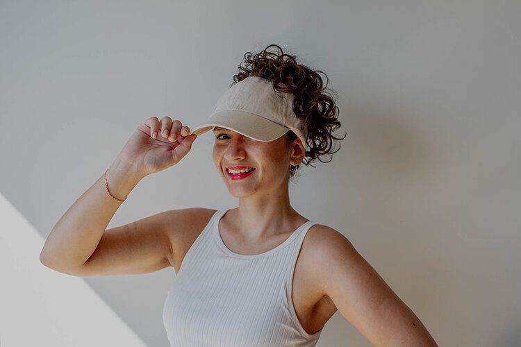 Sustainable styling with Only Curls - low waste haircare for curls 9 PostcardsfromHawaiiSustainablestylingwithOnlyCurlslowwastehaircareforcurlsplasticfreelowwastecurlyhairshampoobarbaseballcaphat